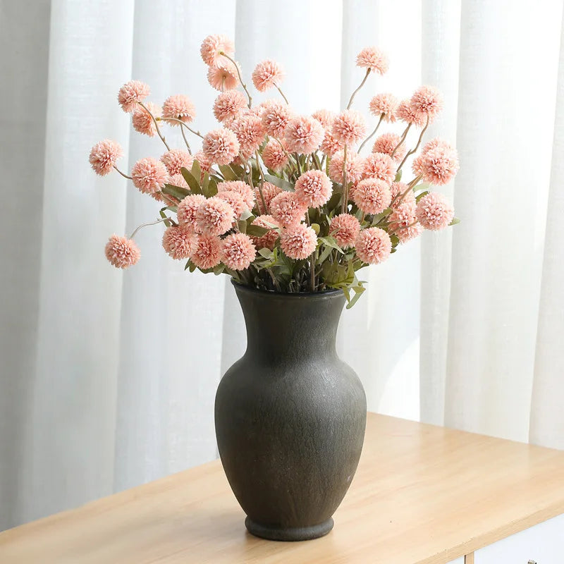 49245939171604 Bring a touch of natural beauty to any space with our lifelike Artificial Dandelion Flower Ball. Perfect for adding a touch of whimsy to your home or office, these flowers require no maintenance and will stay vibrant and fresh all year round.