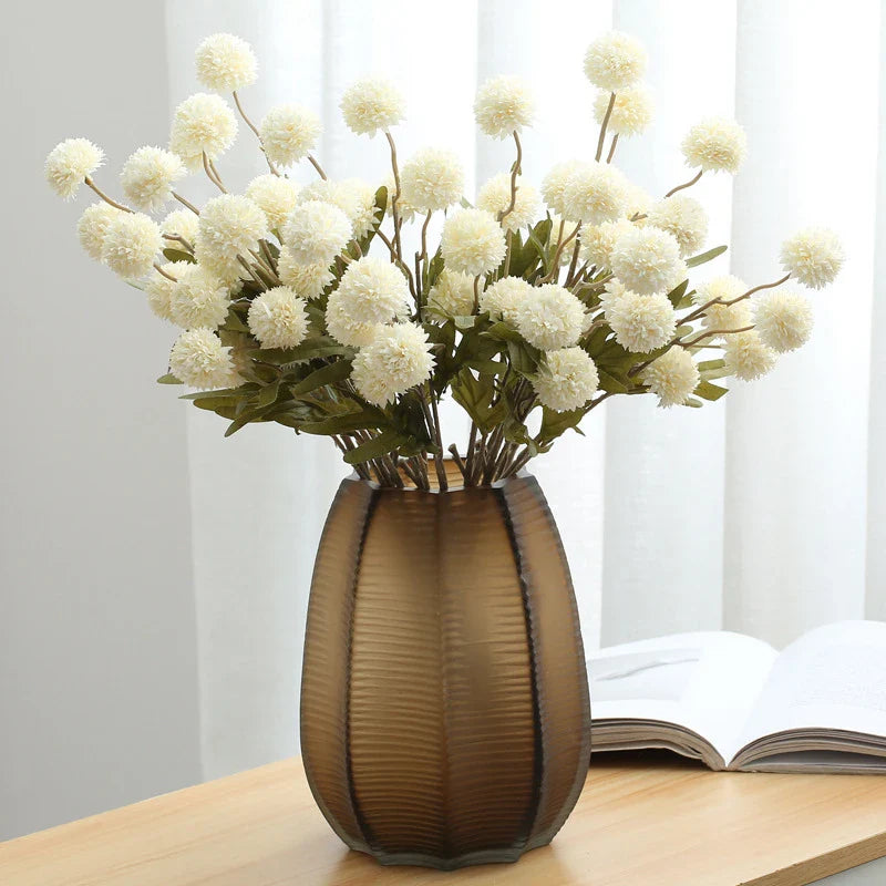 49245939106068 Bring a touch of natural beauty to any space with our lifelike Artificial Dandelion Flower Ball. Perfect for adding a touch of whimsy to your home or office, these flowers require no maintenance and will stay vibrant and fresh all year round.